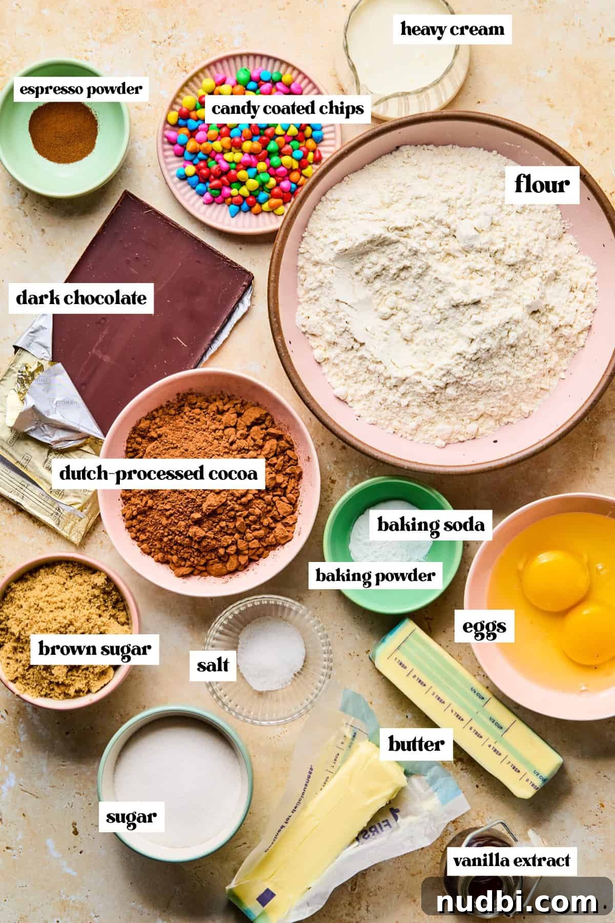 Cosmic Brownie Cookie Recipe: Fudgy, Colorful Chocolate Cookies 4 Cocoa powder, flour, eggs, and other ingredients measured and labeled.