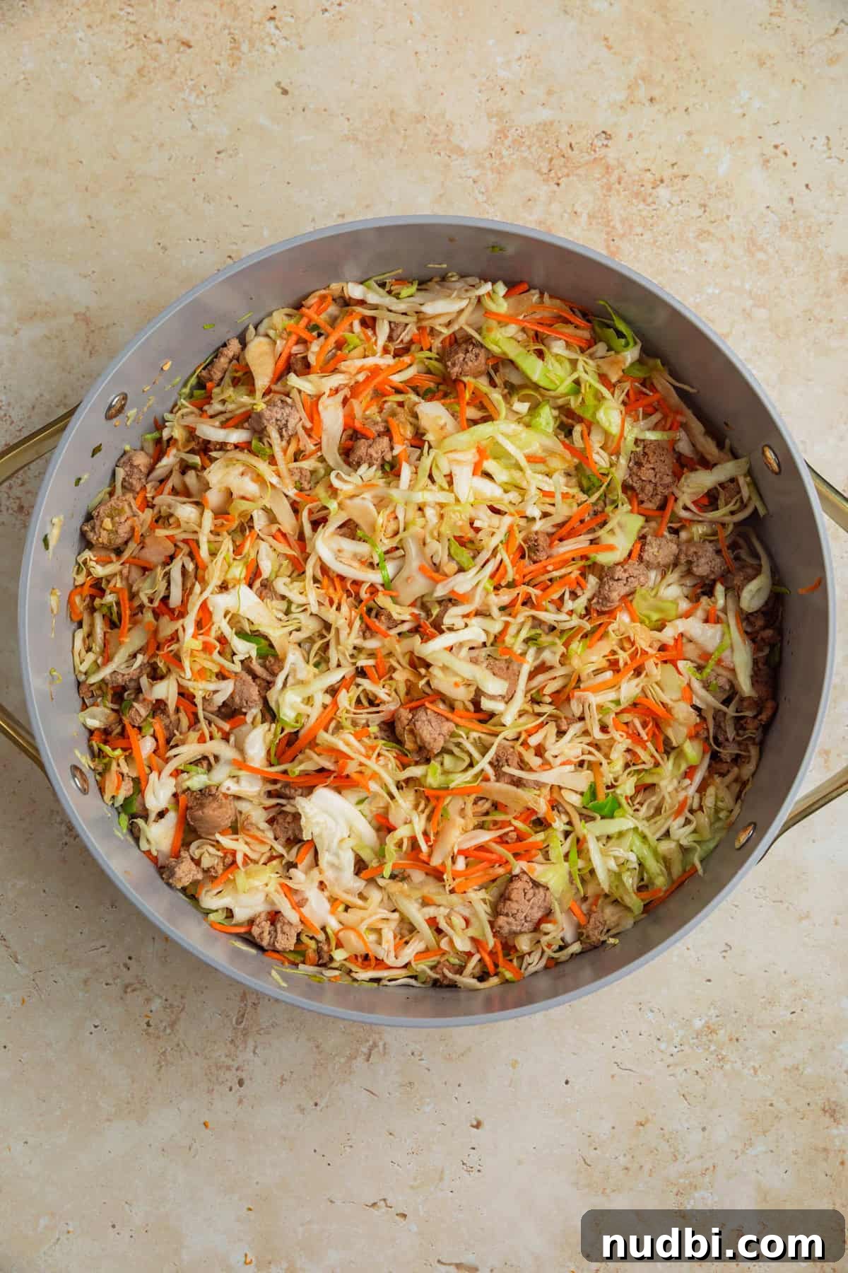 Ground Turkey Egg Roll Bowl Recipe with Asian Slaw 7 Ground turkey egg roll bowl cooked in pan.