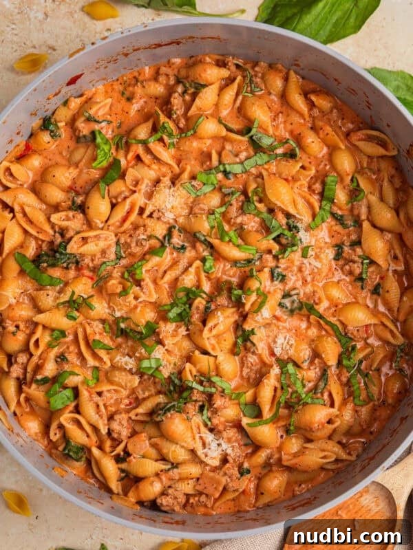 Greek Chicken with Lemon Orzo Pilaf: Flavorful Mediterranean Recipe 12 Creamy tomato and turkey pasta in pot.