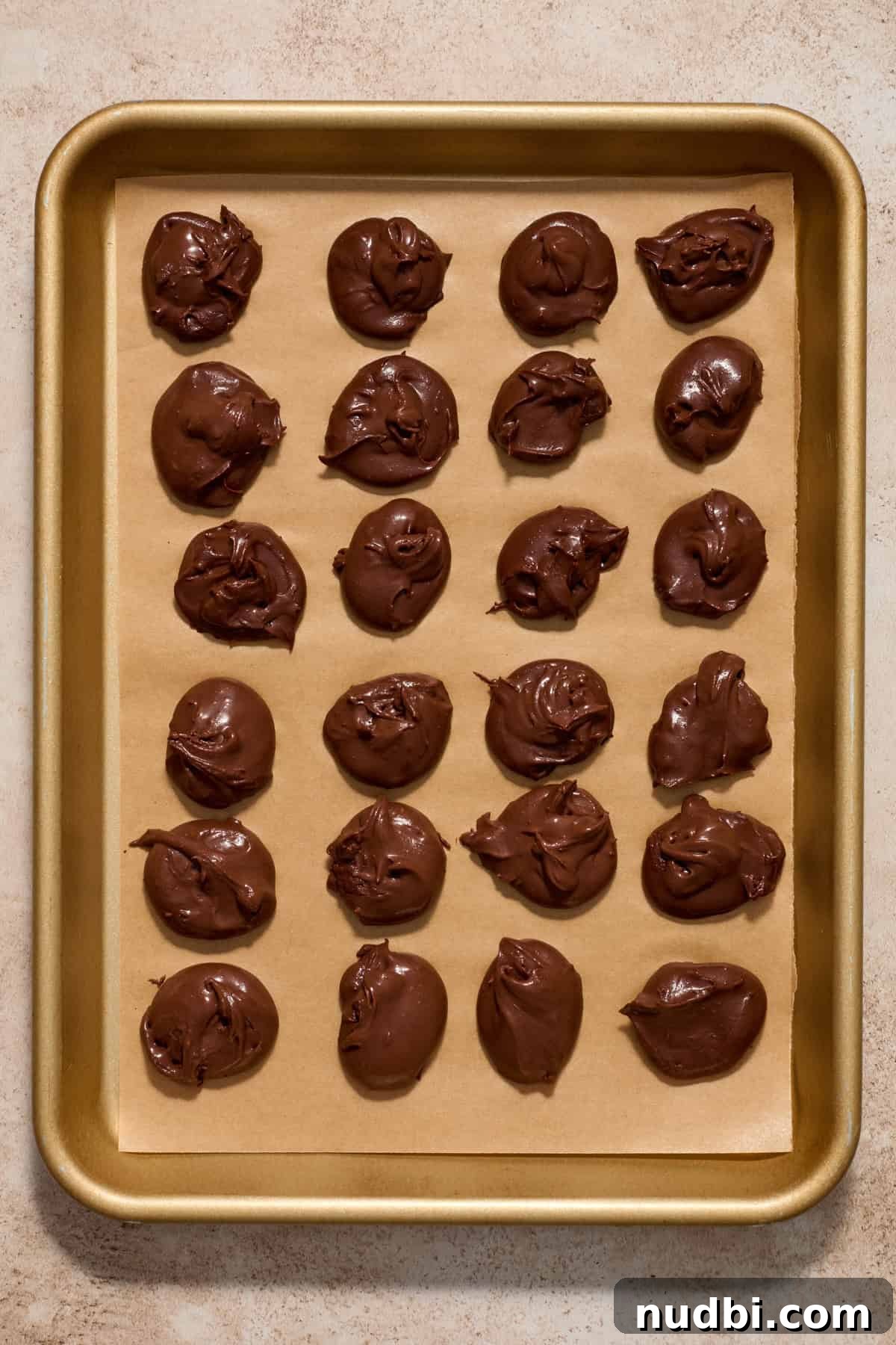 Molten Chocolate Lava Cookies Recipe: Gooey Center Cookies Tutorial 7 Chocolate ganache spooned onto parchment lined pan.