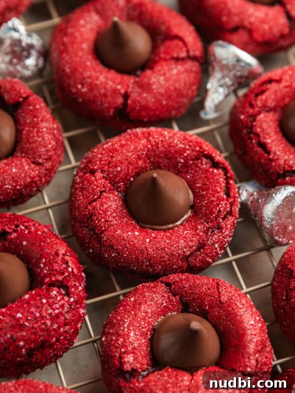 Strawberry Chex Mix Recipe: Sweet, Crunchy Snack for Parties 14 Red velvet cookies with Hershey kiss centers on wire rack.