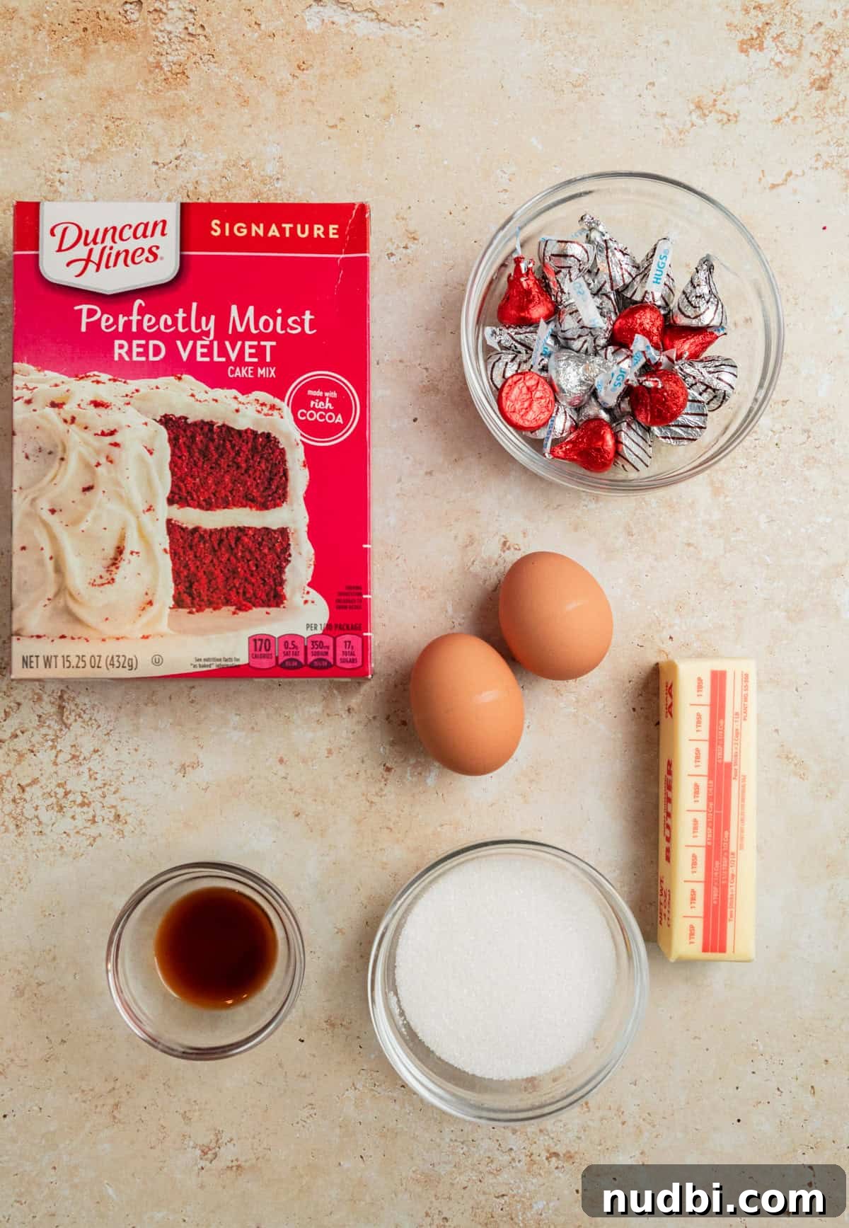 Red Velvet Blossom Cookies Recipe — Soft, Cream Cheese Frosting 4 Red velvet cake mix box, Hershey Kisses, eggs, butter and other ingredients.