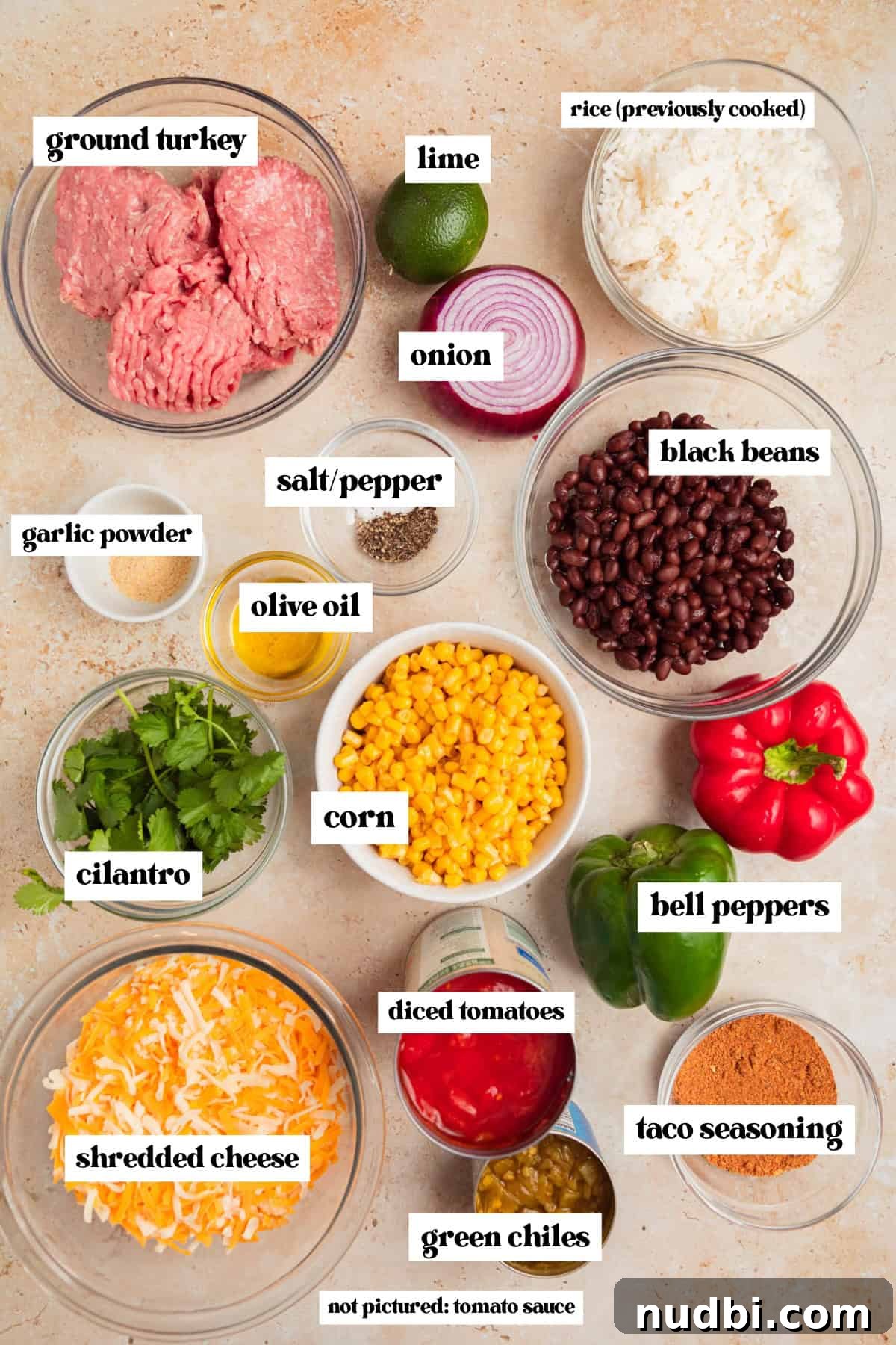 Cheesy Turkey Taco Skillet Dinner Recipe 4 Shredded cheese, bell peppers, meat, corn, black beans, and other labeled ingredients.