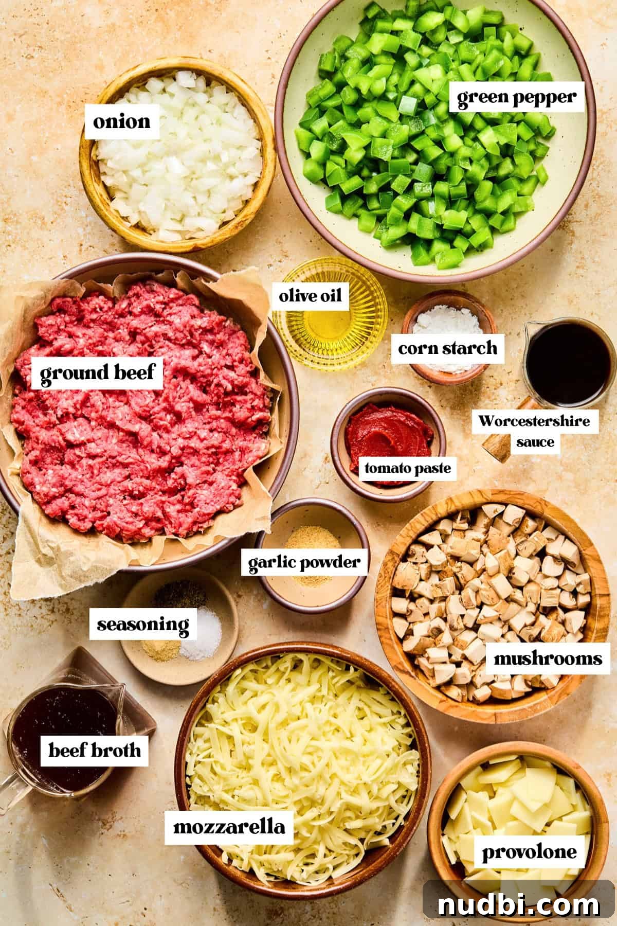 Philly Cheesesteak Rice Bowl Recipe — Savory Steak & Peppers 4 Chopped peppers, beef, cheeses and other ingredients needed for recipe.