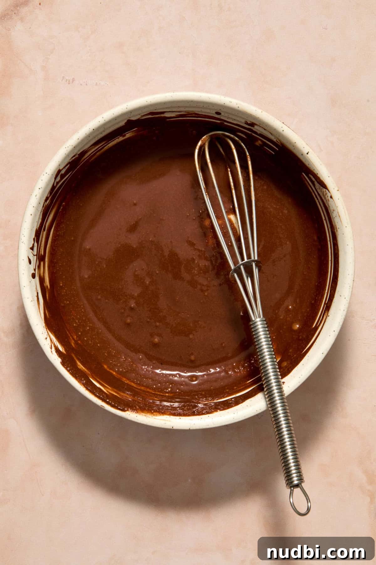 Speckled Easter Egg Shortbread Cookies Recipe 13 Cocoa powder and water whisked in small bowl with whisk.