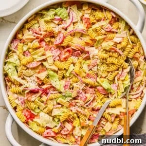 Italian Grinder Pasta Salad Recipe for Perfect Picnic Meals 16 Italian grinder sub pasta salad in serving bowl.