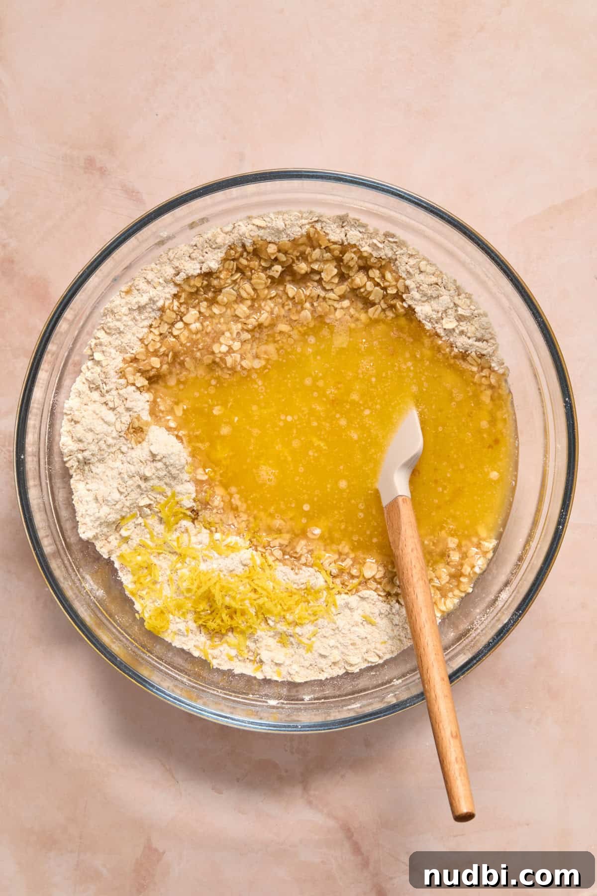 Butter and lemon zest added to oat mixture.