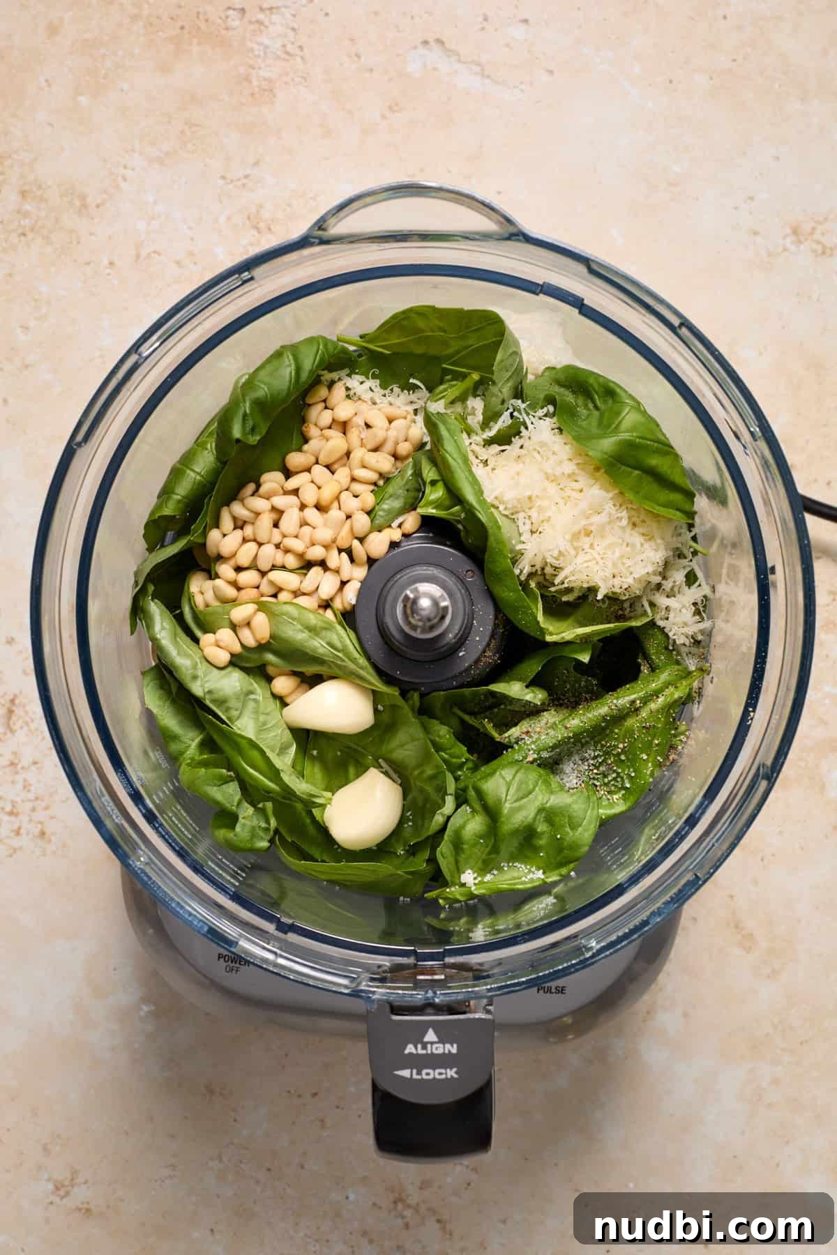 Creamy Tortellini Pesto Salad with Cherry Tomatoes & Spinach 5 Basil, pine nuts, garlic and other ingredients added to food processor.