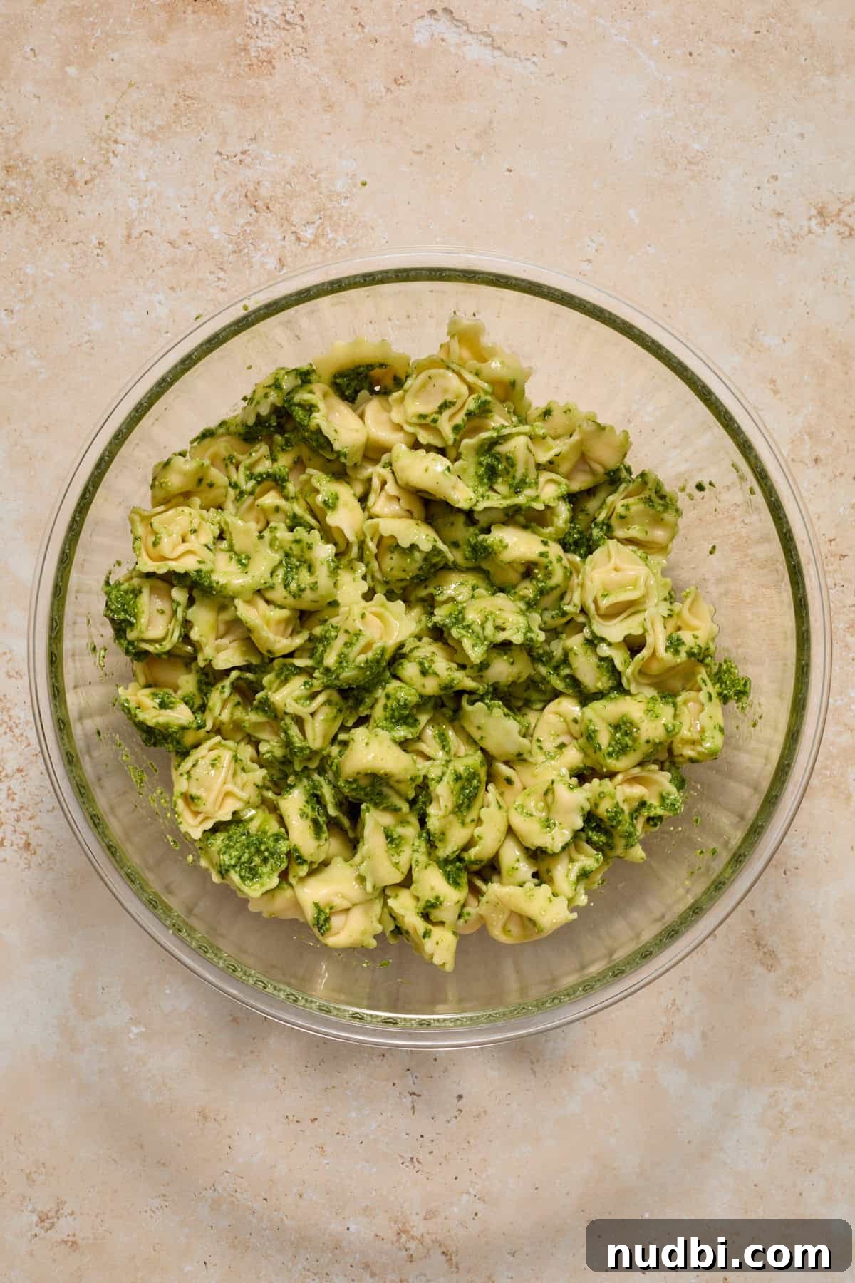 Creamy Tortellini Pesto Salad with Cherry Tomatoes & Spinach 8 Pesto tossed with tortellini.