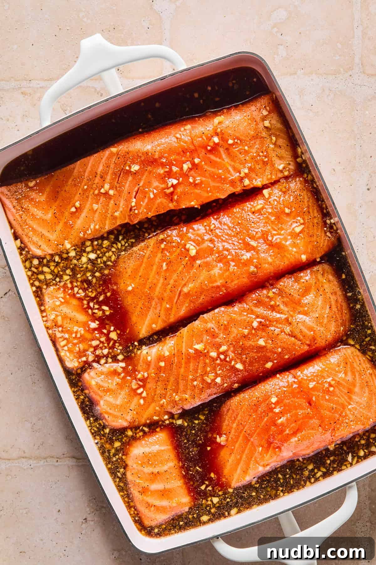 Crispy Grilled Teriyaki Salmon with Sticky Glaze Recipe 7 Marinade in shallow dish wth salmon filets.