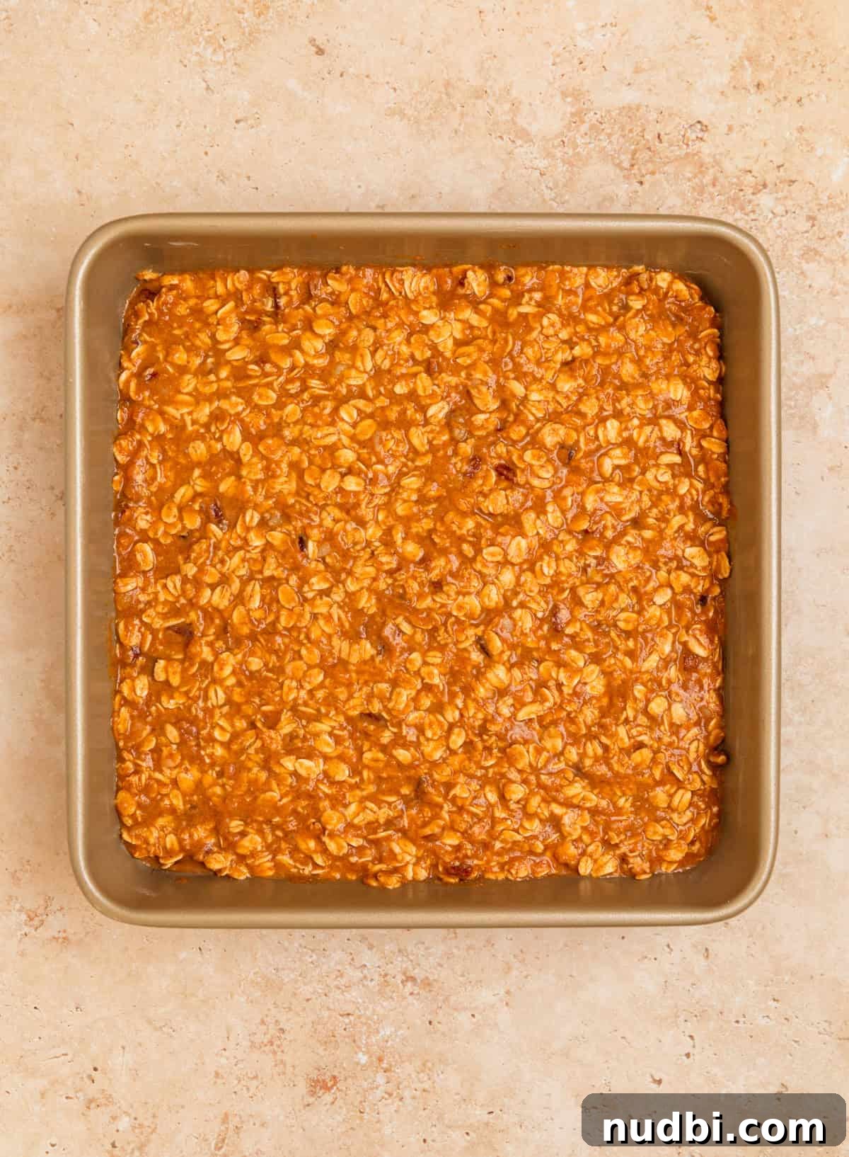 Pumpkin oatmeal mixture in baking pan before baking.