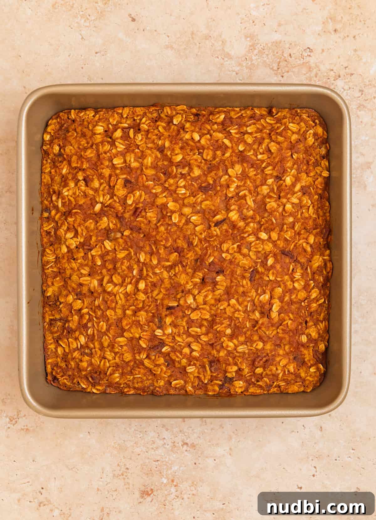Baked pumpkin oatmeal in pan.
