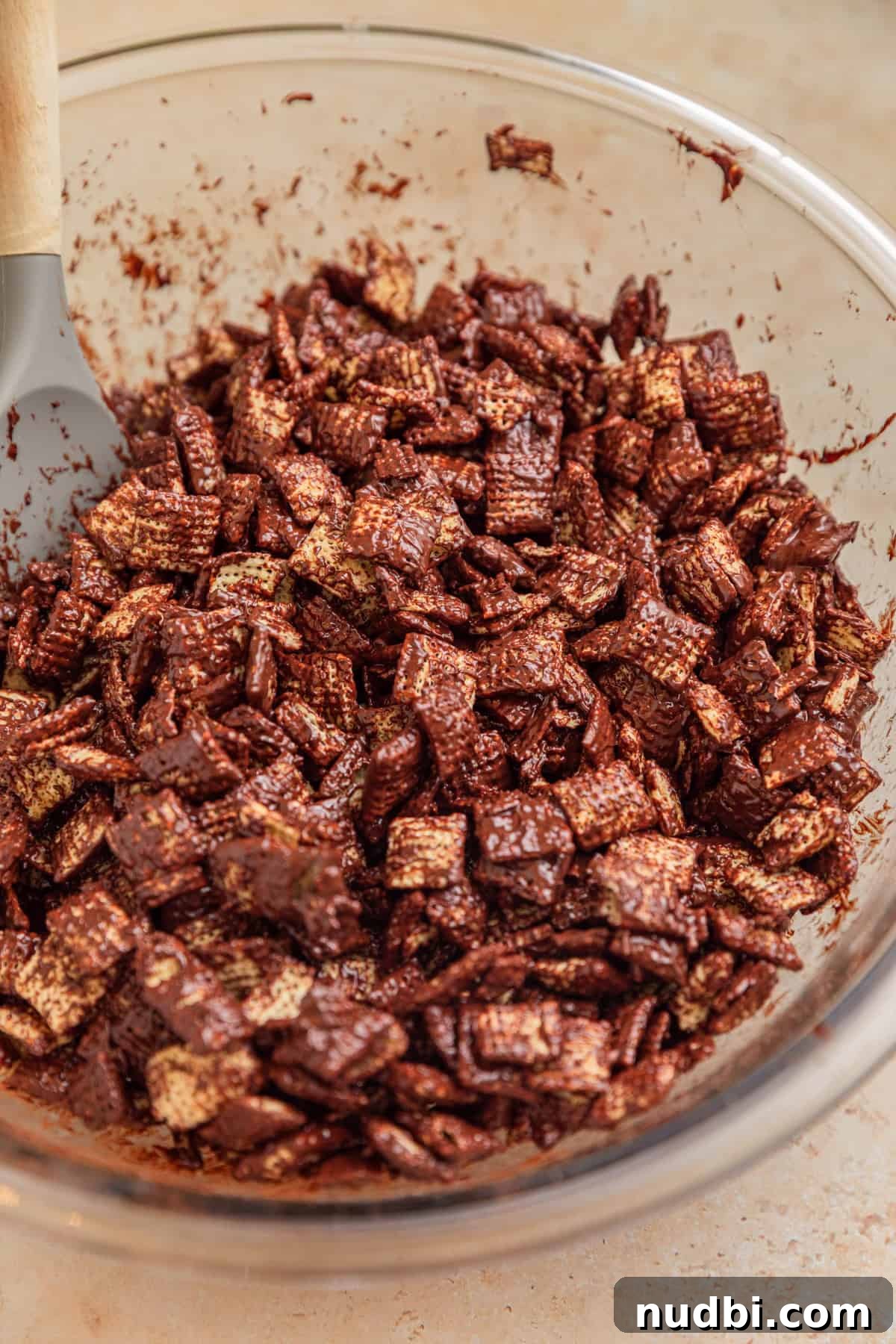 Christmas Puppy Chow Recipe: Festive Snack Mix for Holiday Parties 6 Bowl with dark chocolate coated chex cereal.