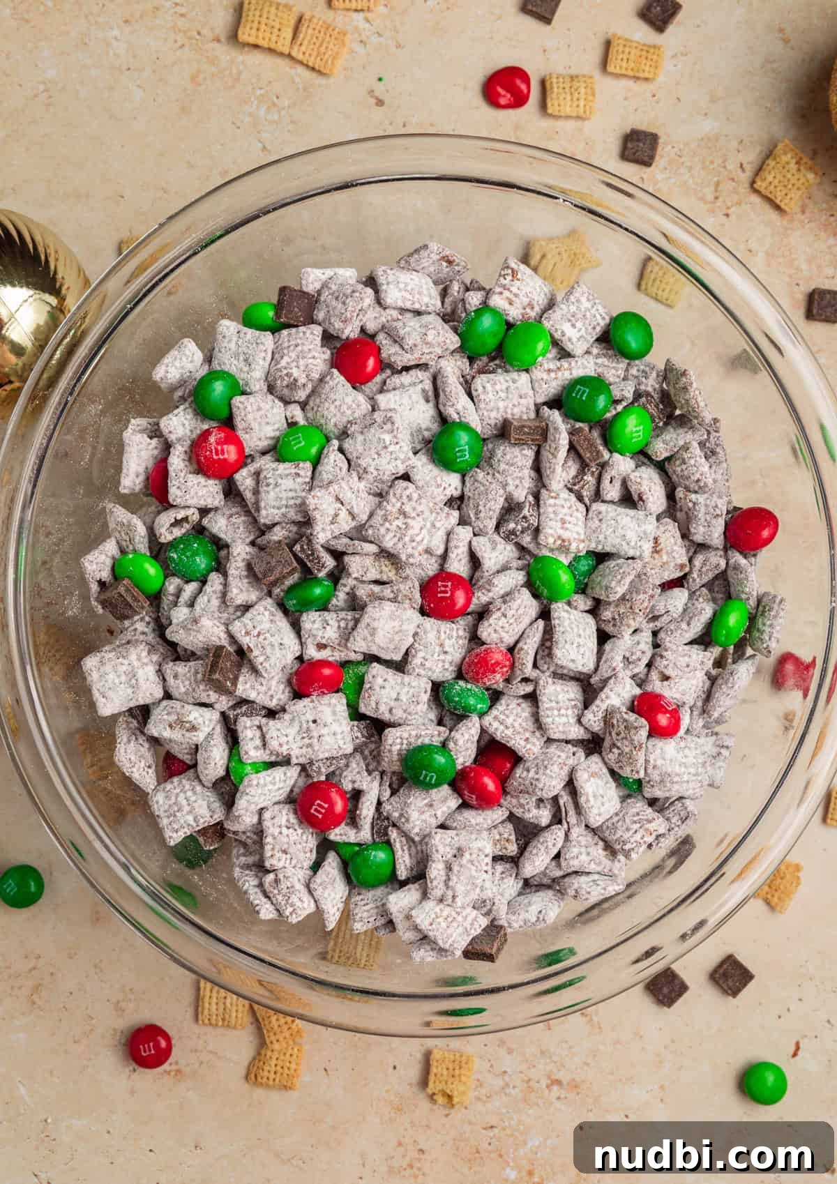 Christmas Puppy Chow Recipe: Festive Snack Mix for Holiday Parties 9 Christmas puppy chow in bowl.