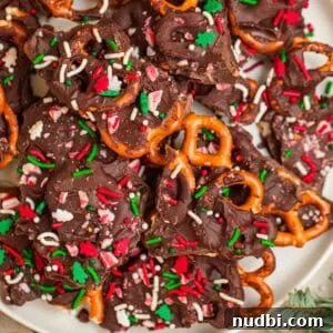 Peppermint Dark Chocolate Pretzel Bark Recipe for Holiday Treats 7 Overhead view of plate with dark chocolate candy cane pretzel bark.