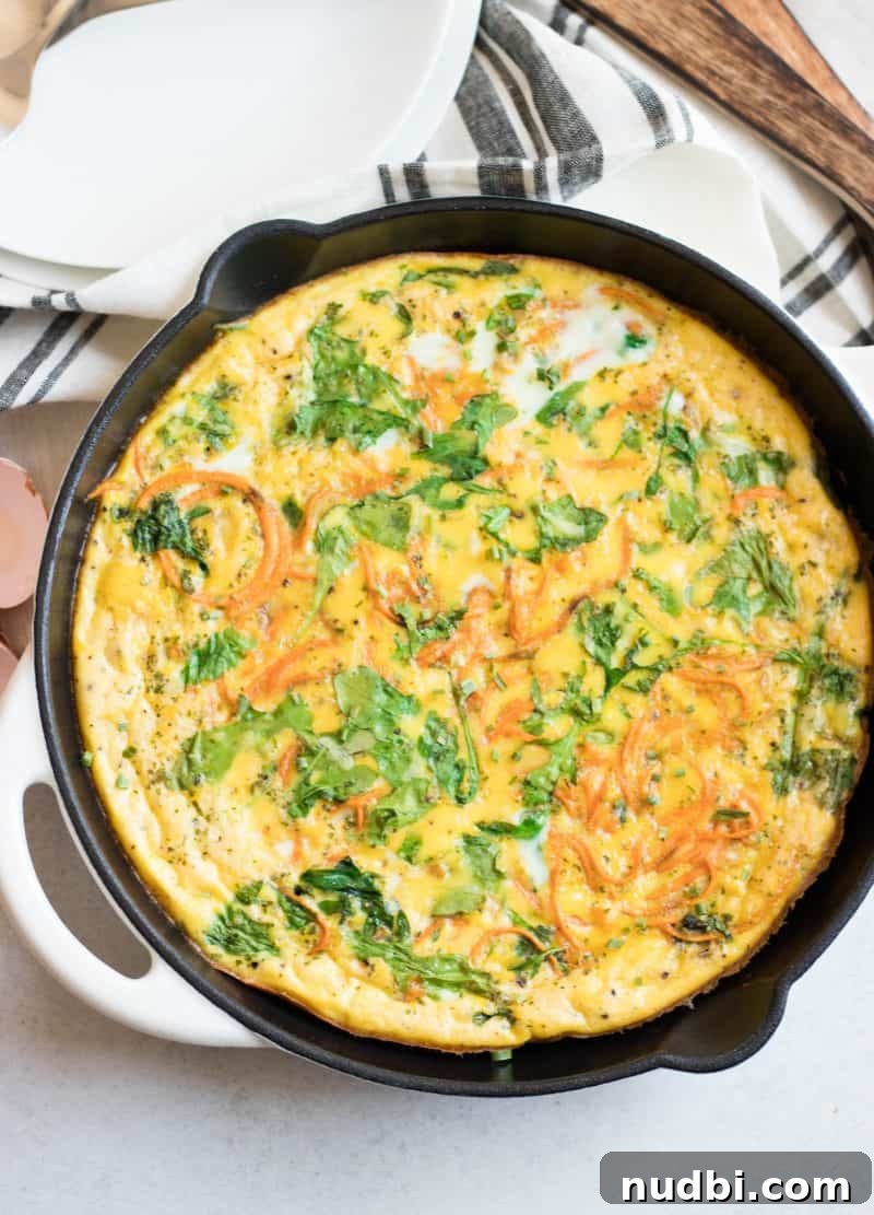 Spiralized Sweet Potato and Baby Arugula Frittata 3 Sweet potato frittata baked in cast iron skillet.