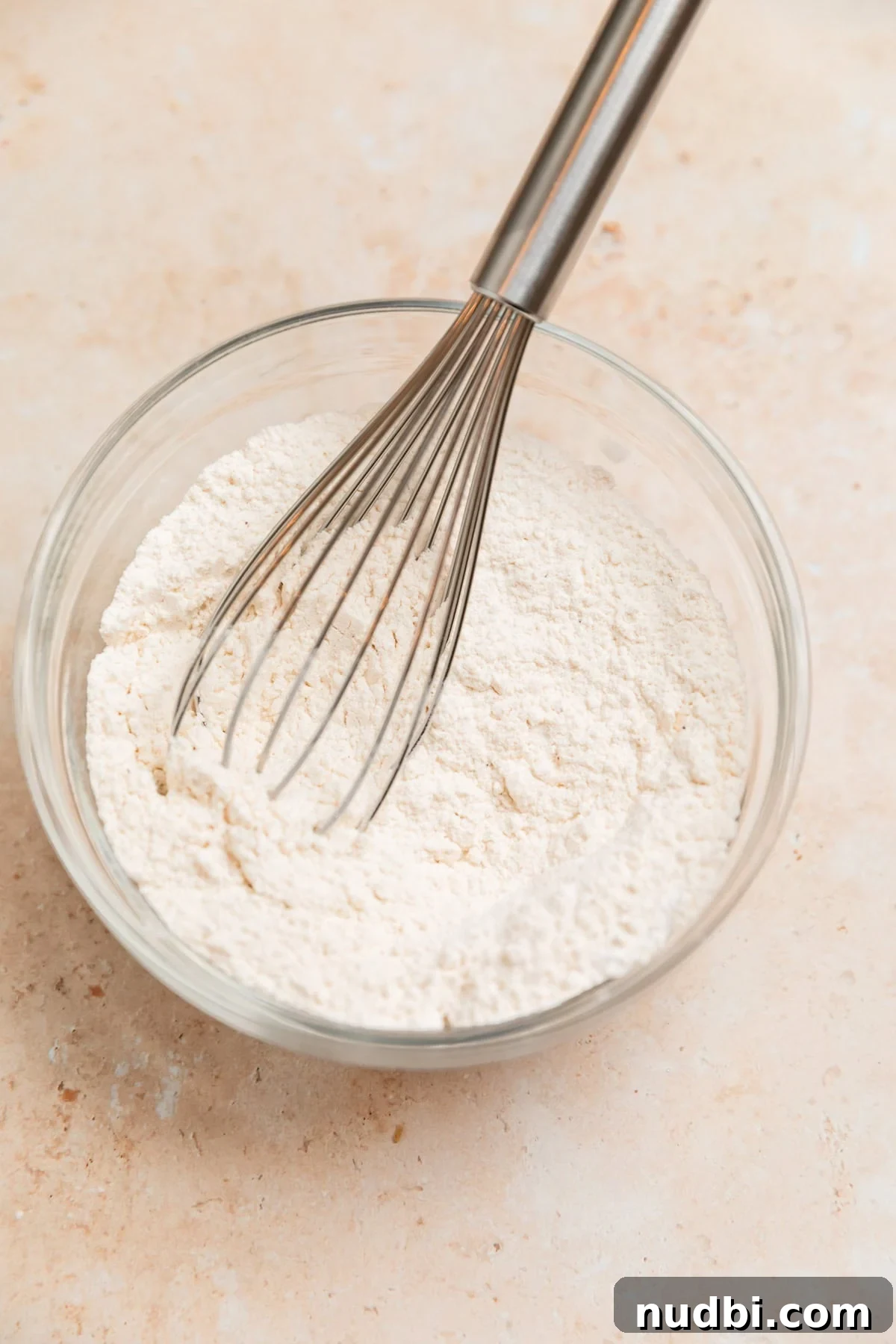 Light and Fluffy Greek Yogurt Donuts Recipe 6 Dry ingredients whisked together in bowl.