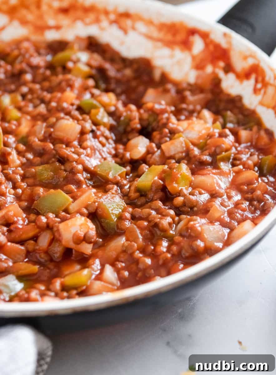 15-Minute Vegan Sloppy Joes Recipe for Quick Weeknight Meals 3 Lentil sloppy joes in skillet.