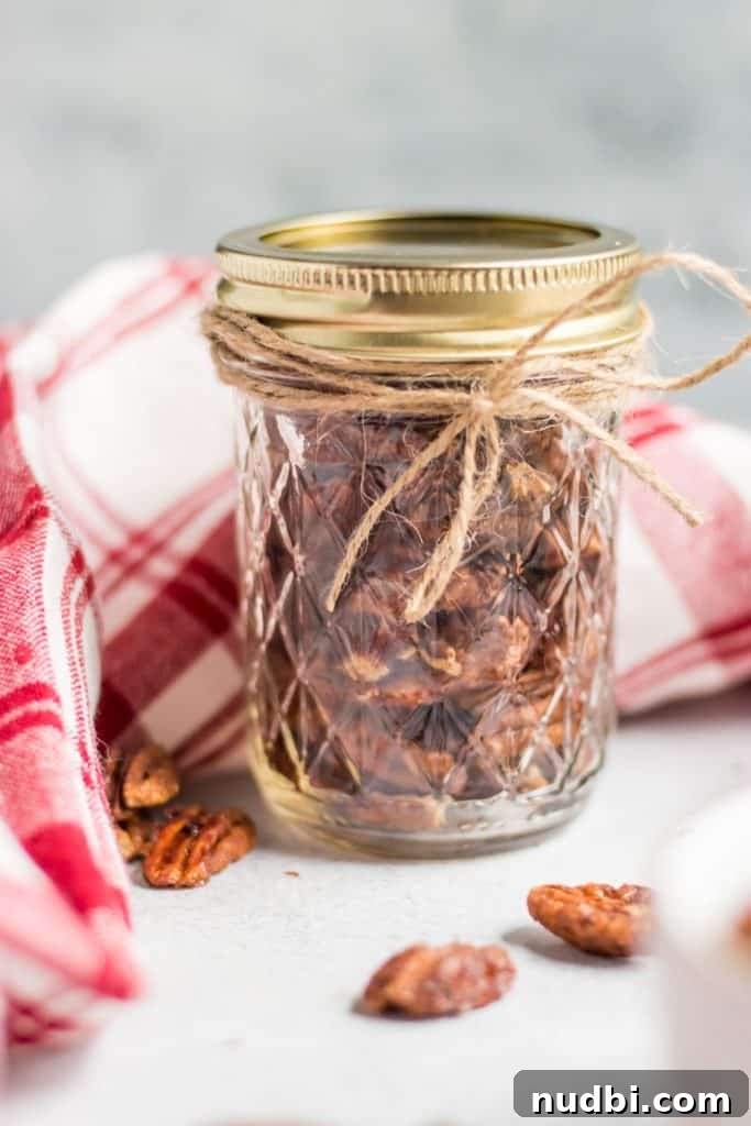 Maple Vanilla Spiced Pecans Recipe — Sweet & Crunchy Snack 4 Maple Vanilla Spiced Pecans in Ball Jar with bow.