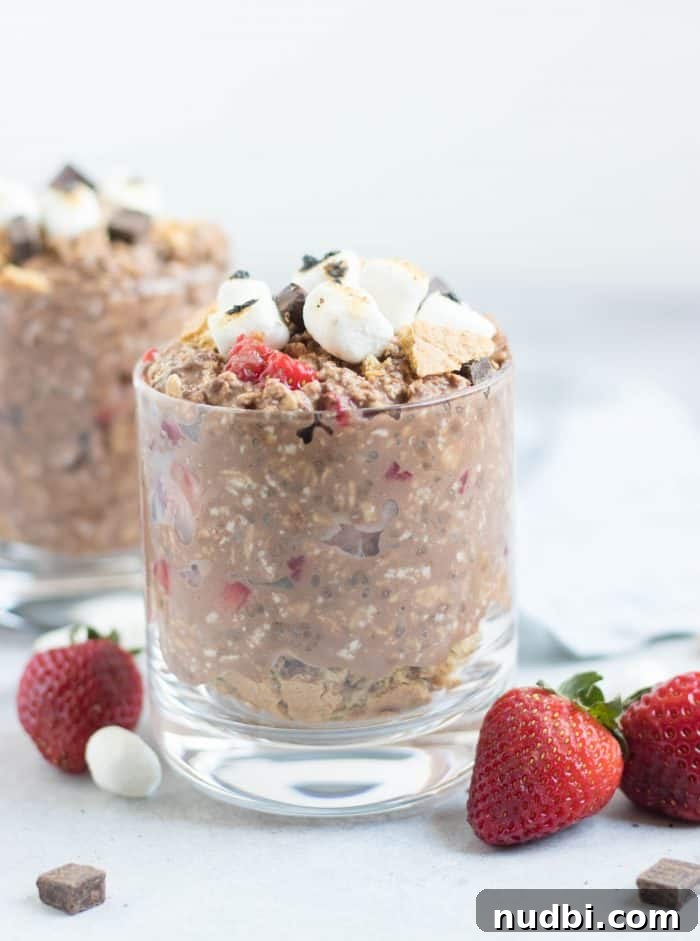 Strawberry S’mores Overnight Oats Recipe for Summer Breakfast 2 Strawberry S'mores Overnight Oats. Your favorite campfire treat for breakfast? Yes! Fresh strawberries, chocolate and even crushed graham crackers make this a fun make ahead breakfast! #overnightoats #smores #chocolate