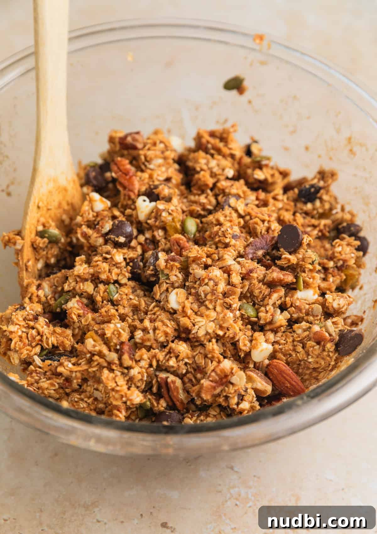 Homemade Trail Mix Bars Recipe – Portable Snack Bars for Hiking 9 Trail mix oatmeal bar ingredients mixed together in bowl.