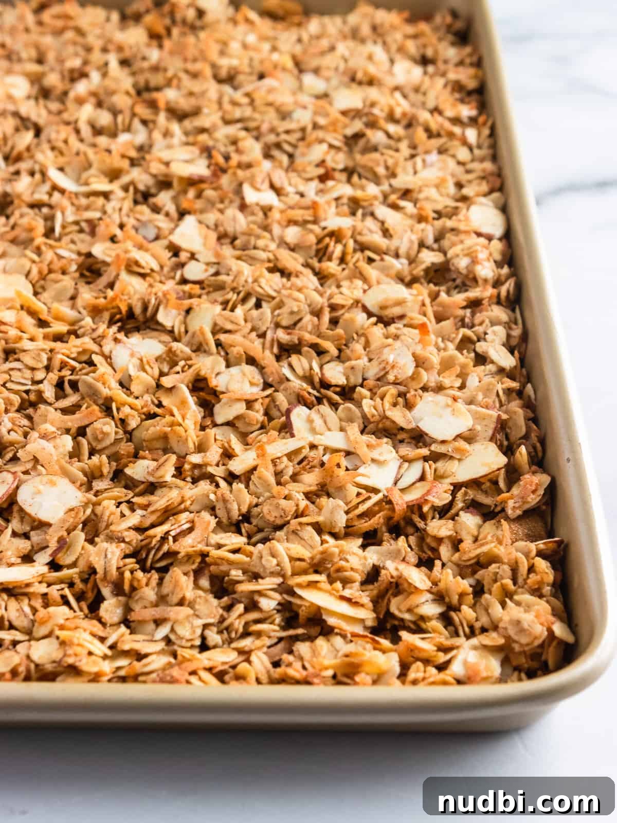 Crunchy Homemade Granola Recipe with Oats and Nuts 5 Baking sheet of freshly baked easy granola recipe.