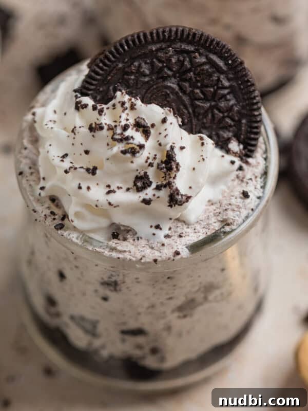 No-Bake Oreo Ice Cream Pie Recipe — Creamy Chocolate Sandwich Dessert 16 Oreo cheesecake cups topped with whipped cream and an Oreo along with more cookie crumbs.