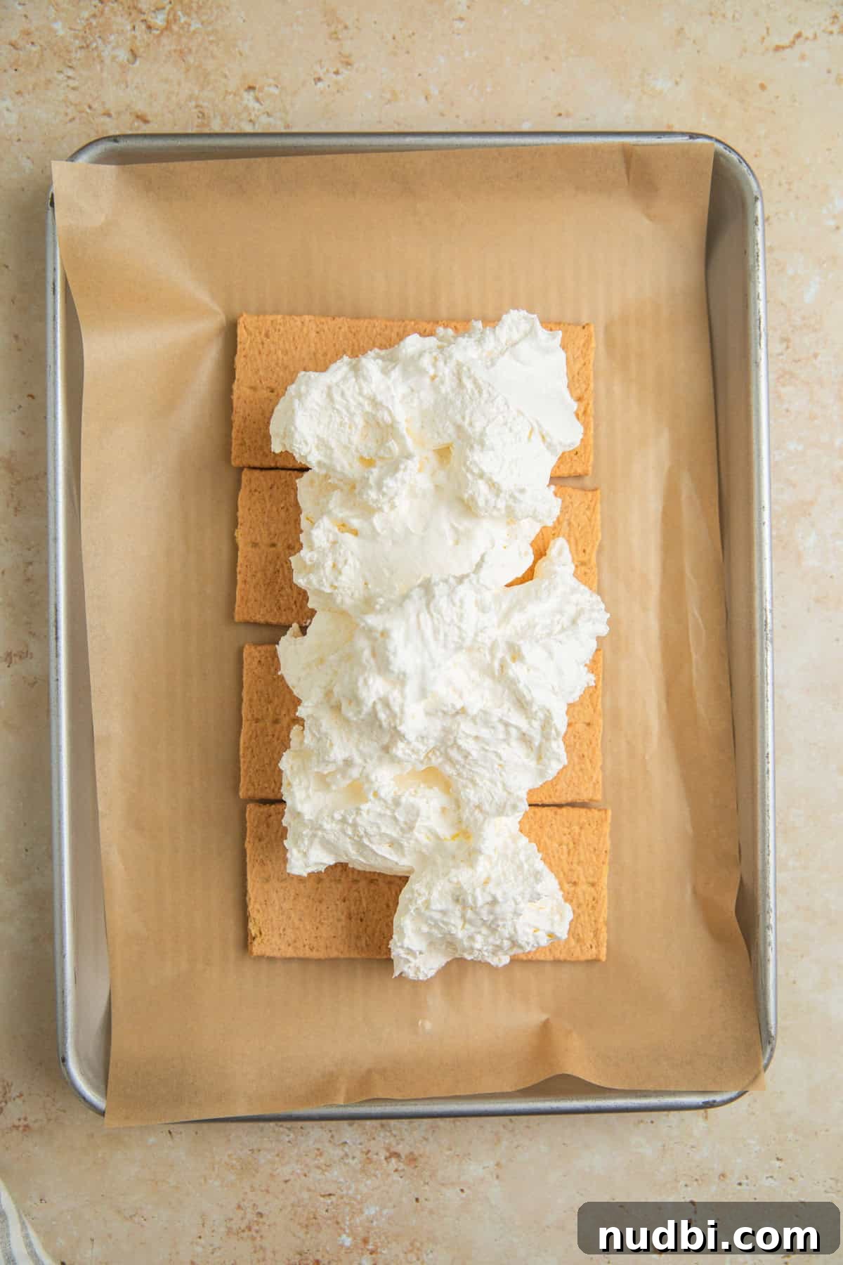 Lemonade Ice Cream Sandwiches Recipe — Refreshing Summer Treat 5 Graham cracker sheets with whipped topping over top.
