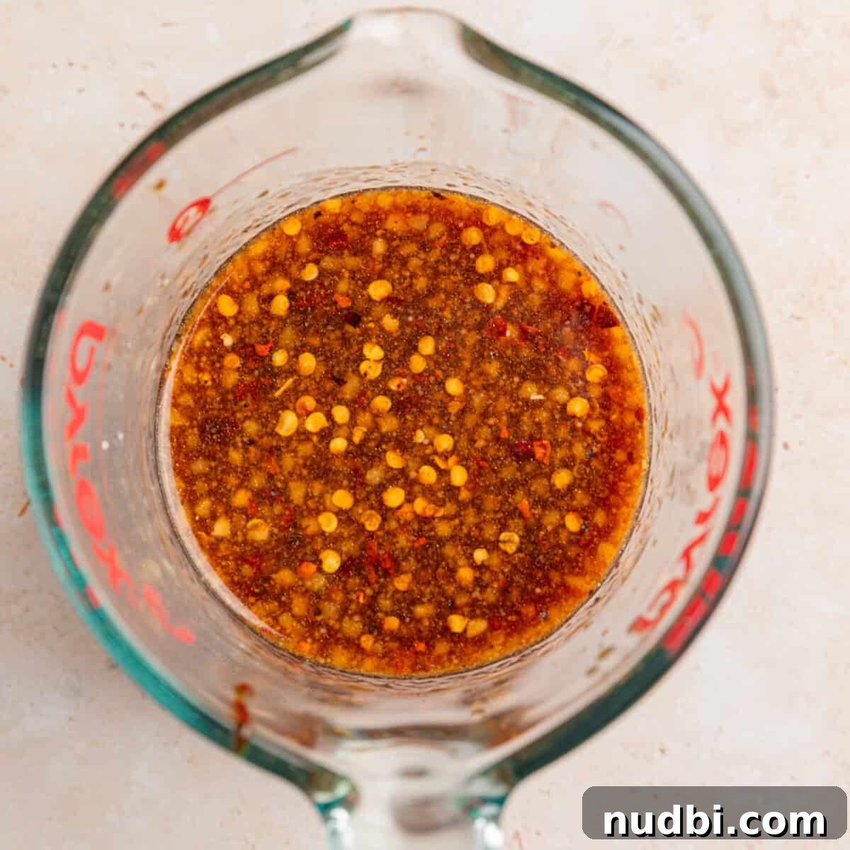 Savory Ground Beef Ramen Noodle Recipe 5 Stir fry sauce in measuring cup.