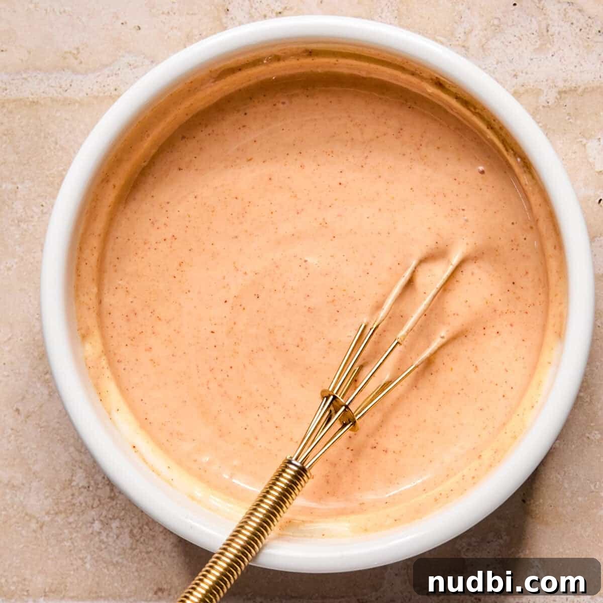 Turkey Burger Bowls with Creamy Special Sauce 6 Special burger sauce in white bowl with whisk.