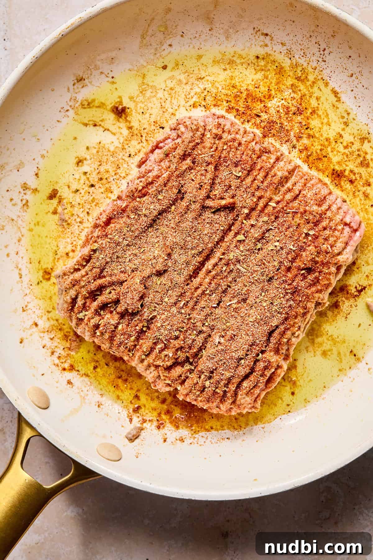 Turkey Burger Bowls with Creamy Special Sauce 7 Ground turkey in skillet with seasoning on it.
