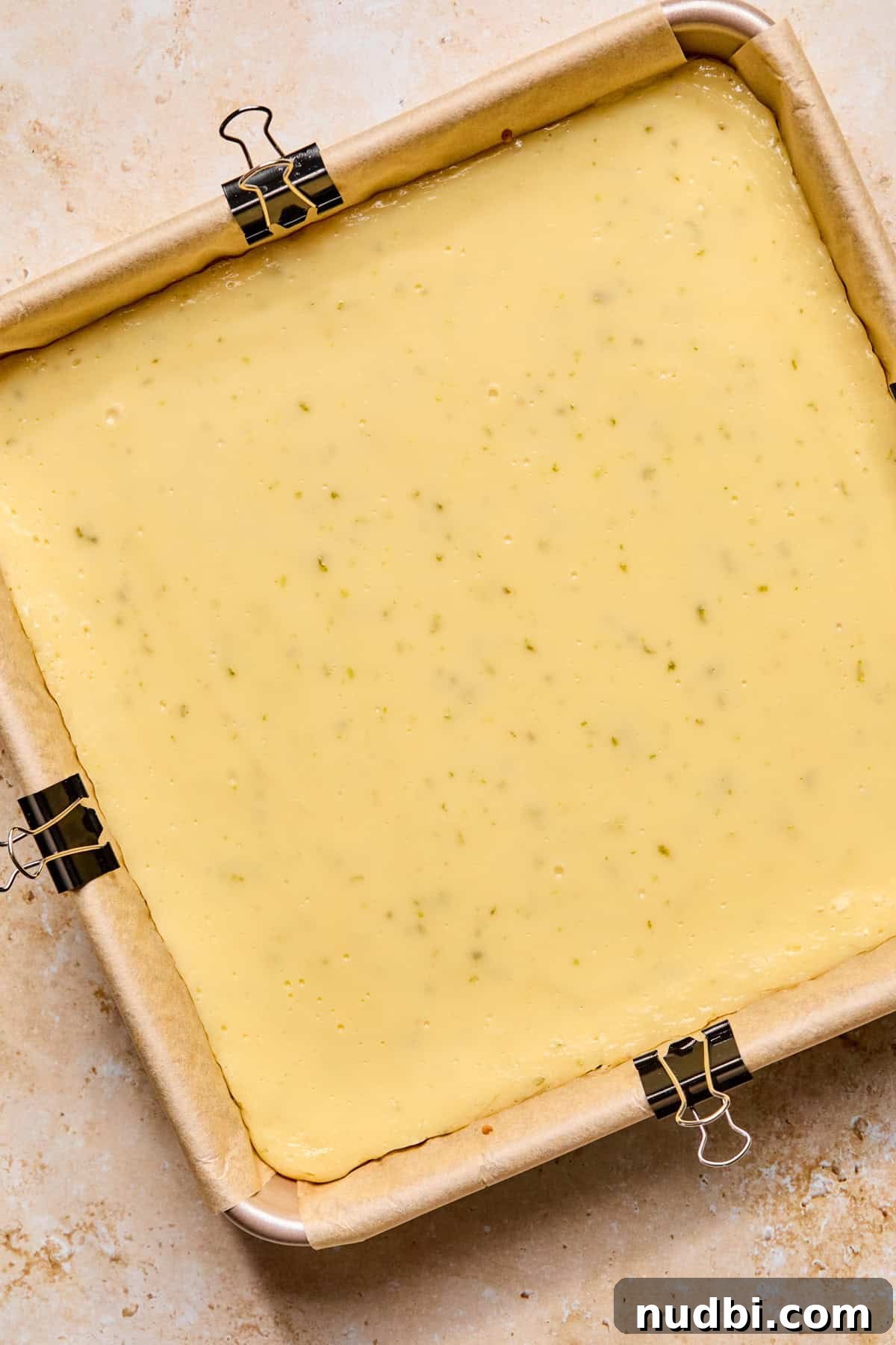 Margarita Bar Ideas for Parties and Entertaining 10 Baked creamy margarita bars in pan.