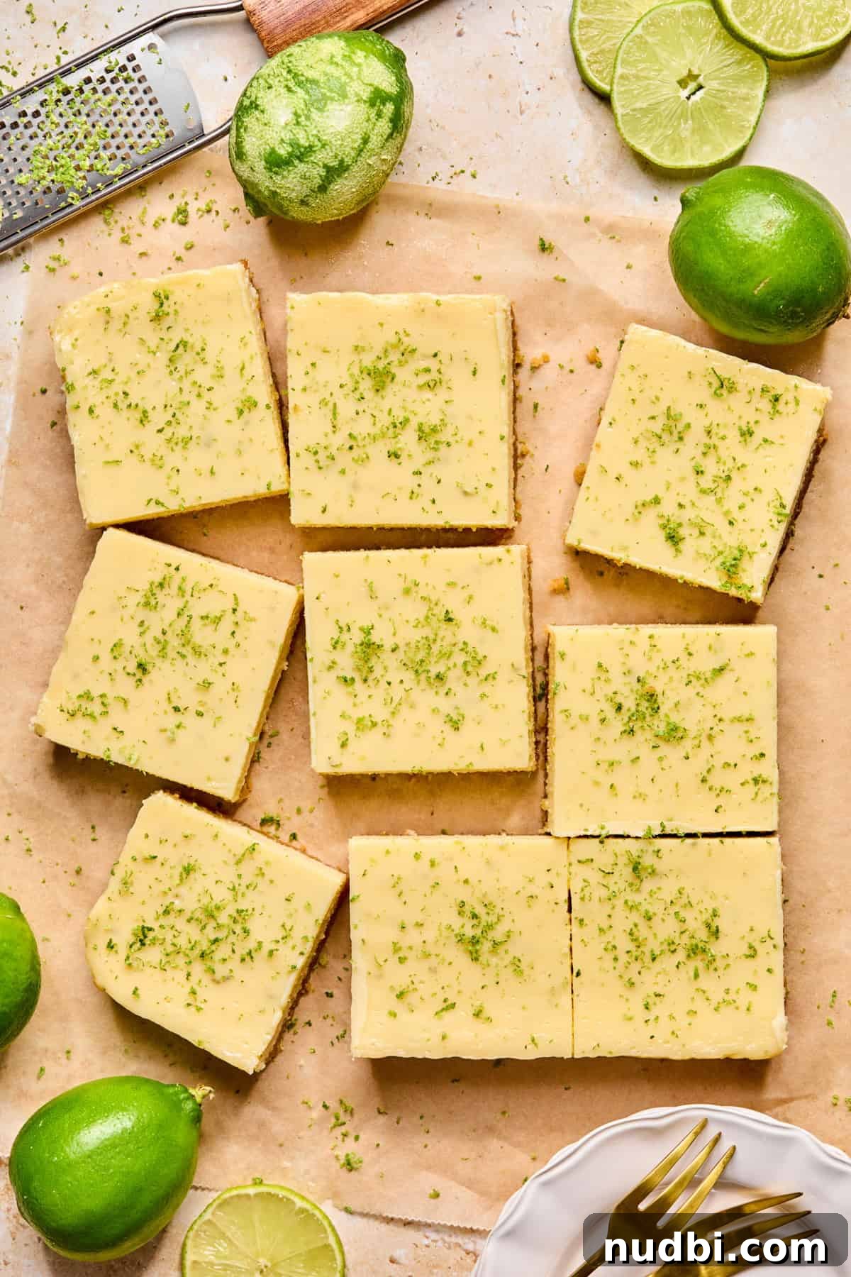 Margarita Bar Ideas for Parties and Entertaining 11 Overhead view of margarita lime bars on parchment paper.