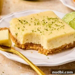 Margarita Bar Ideas for Parties and Entertaining 16 Creamy margarita bar on plate with forkful.