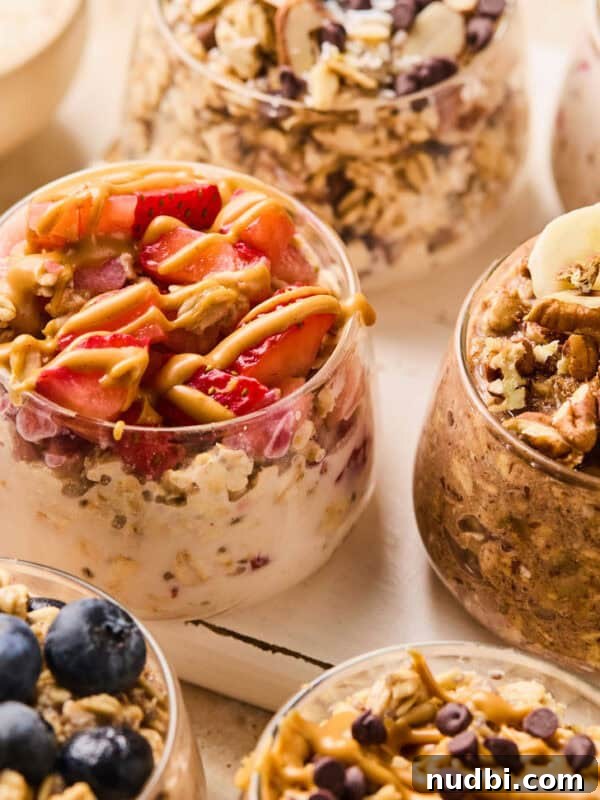Assorted overnight oats in glasses including several flavors.